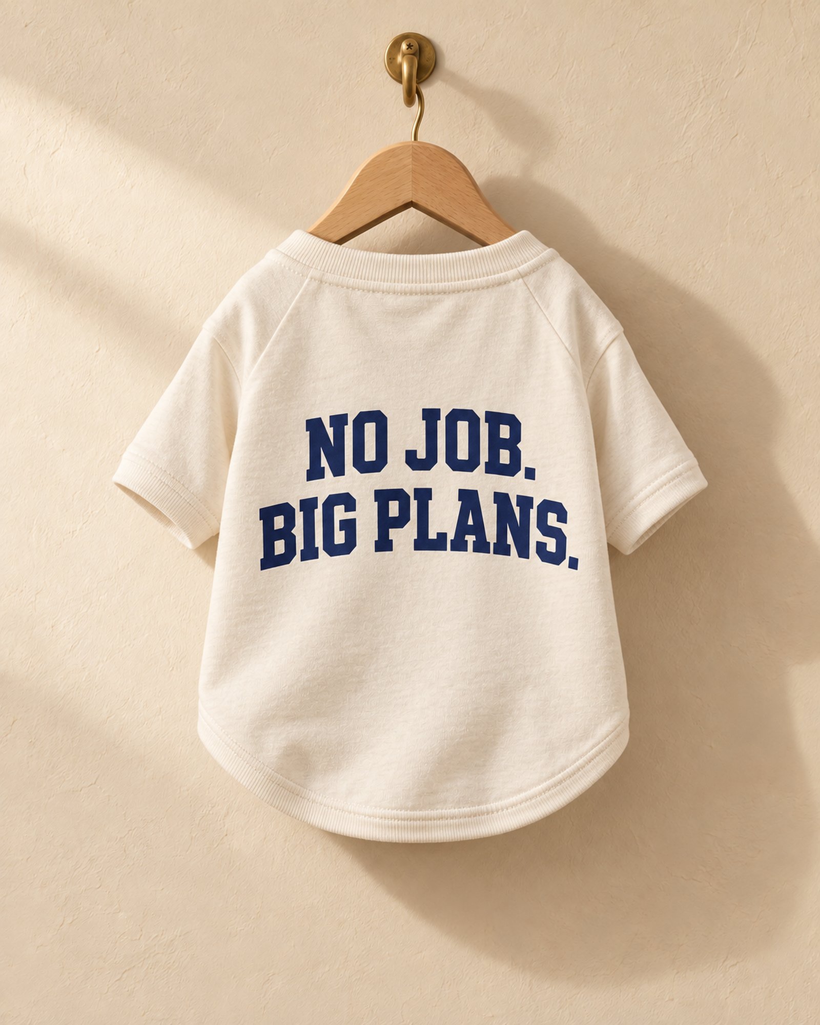 Cream No Job. Big Plans. dog tee on a hanger, back print